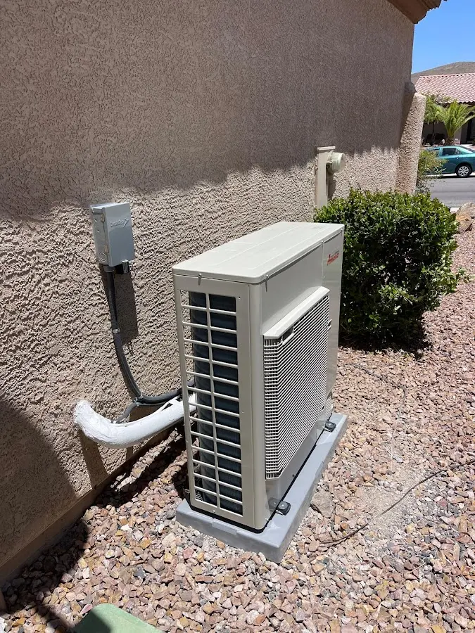 Residential air conditioning condenser unit in Hopewell